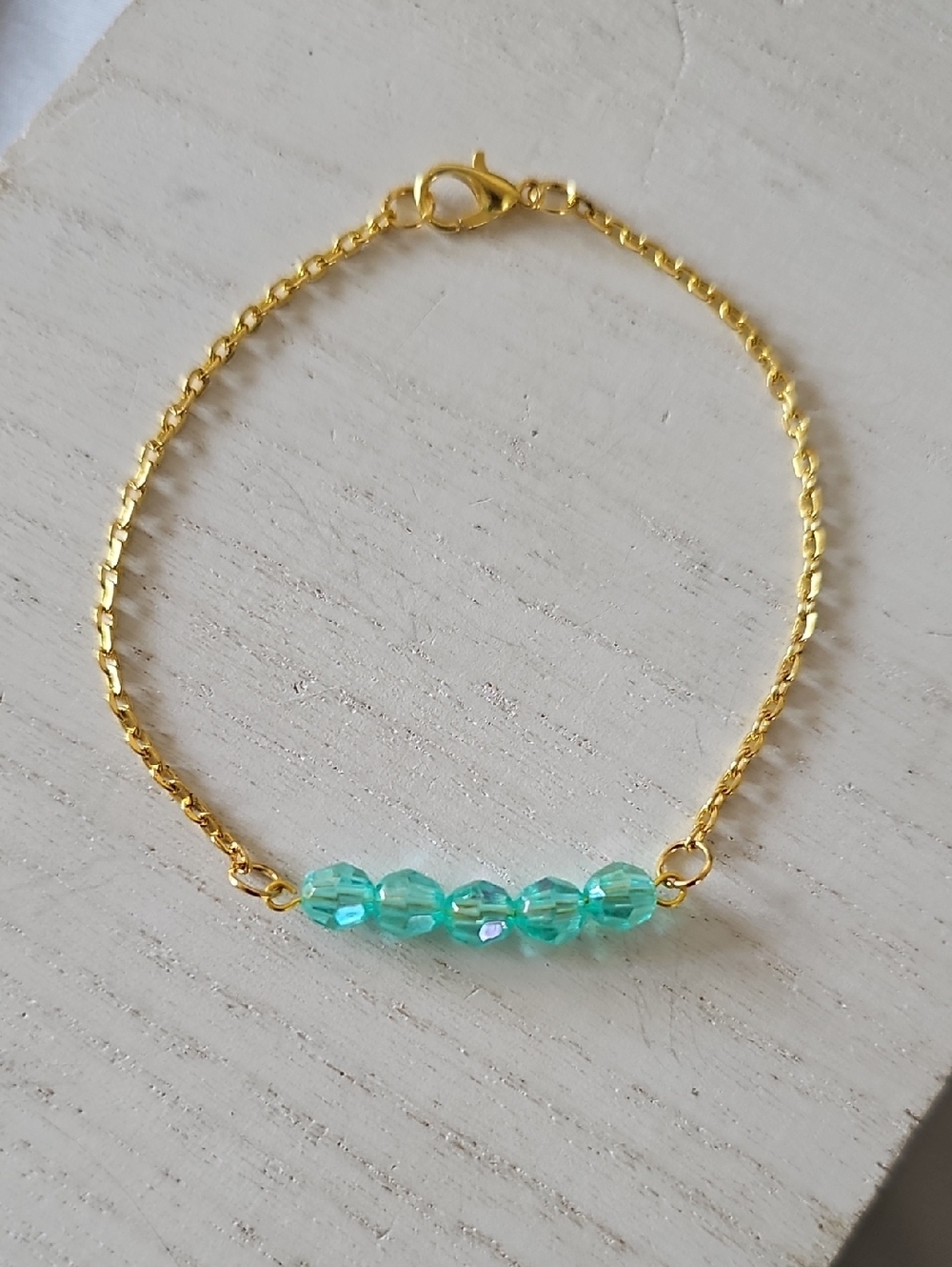 Gold Chain Bracelet with Aqua Blue Faceted Beads